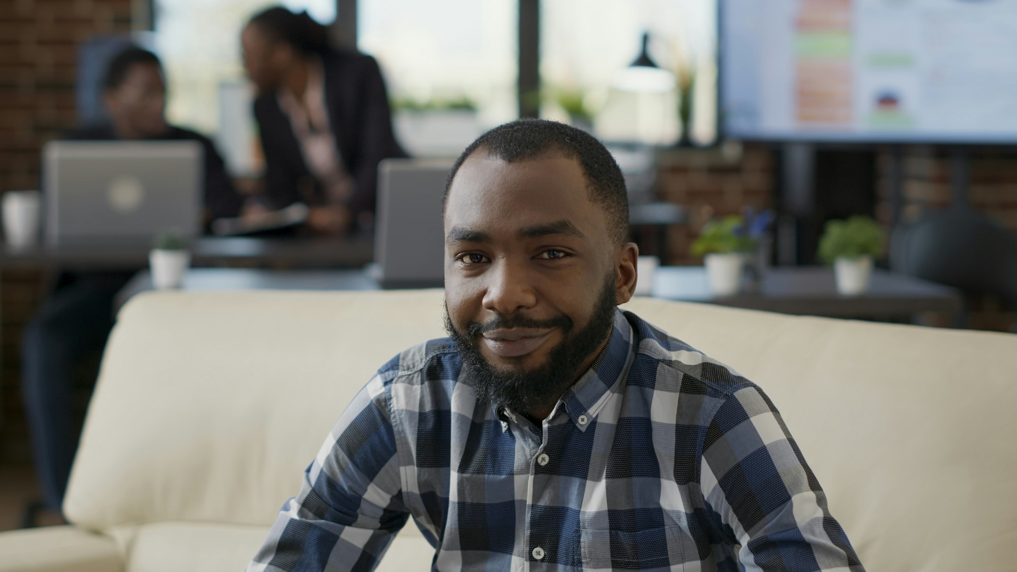 Portrait of african american person smiling in office