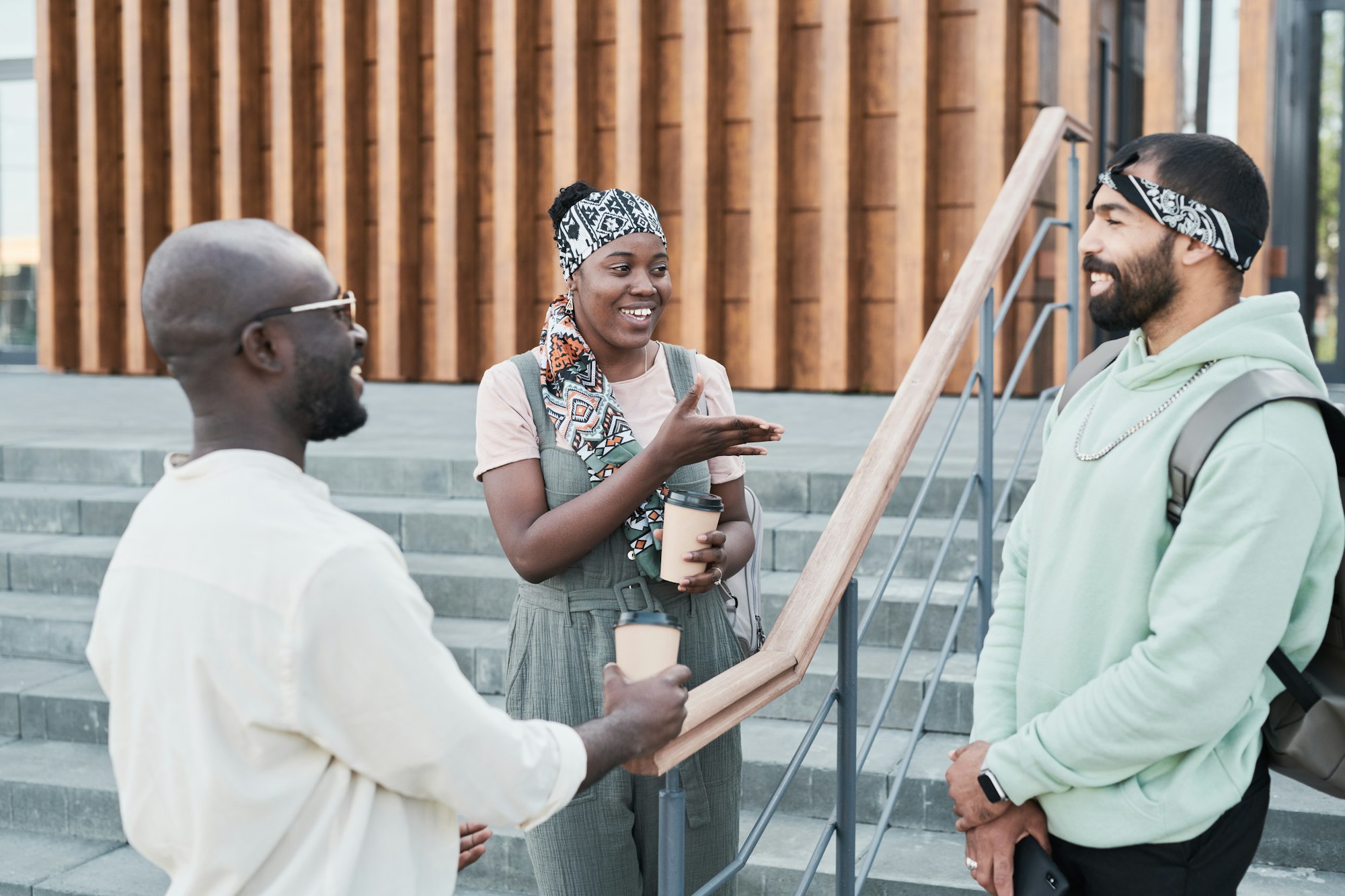 Young people gathering with sporty friend